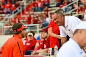 Gus Malzan and Coach